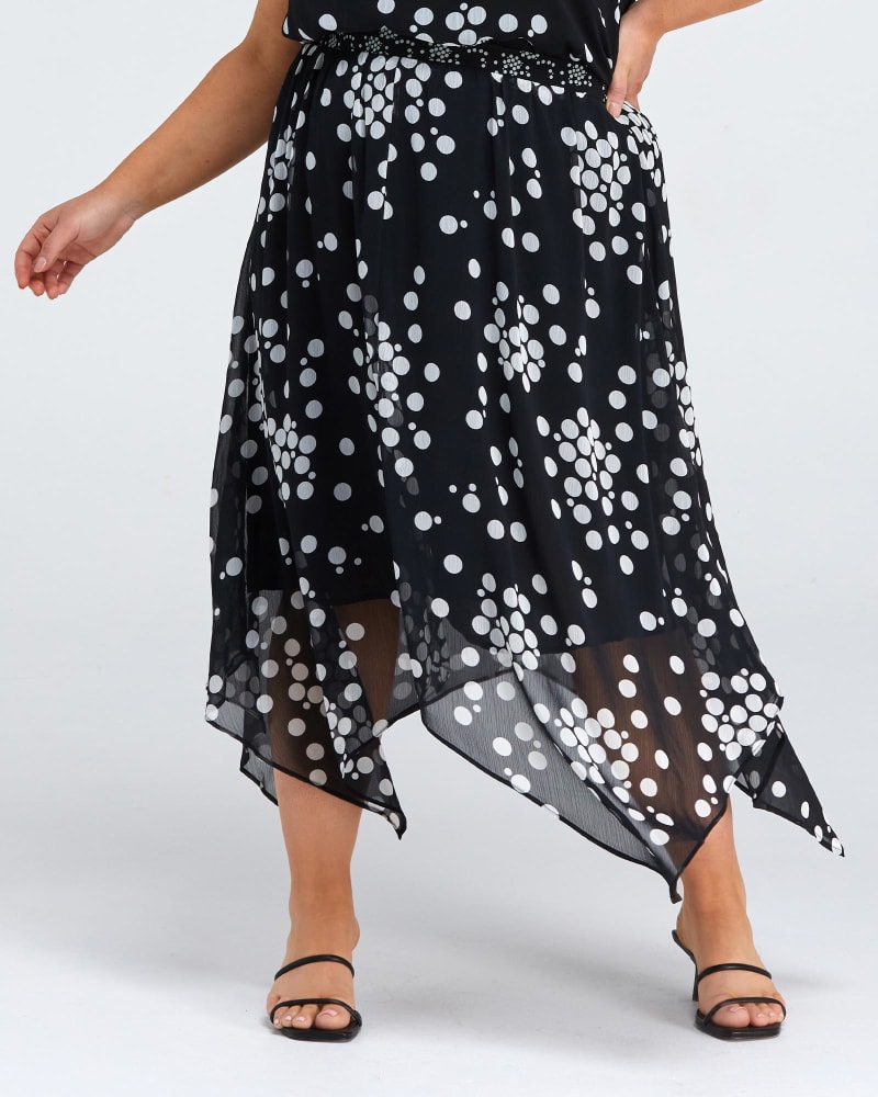 Front of a model wearing a size 3X Adele Spot Skirt in Black/Milk by Estelle. | dia_product_style_image_id:264556